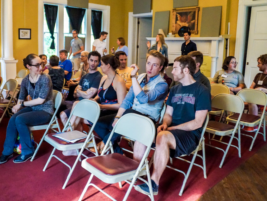 Rusticatio participants converse in the Aula Scholastica